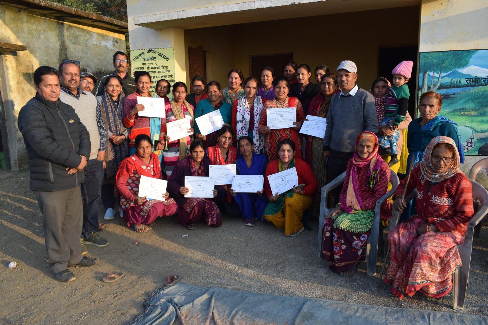 Graduates of GMUS women's leadership and entrepreneurship workshop holding certificates